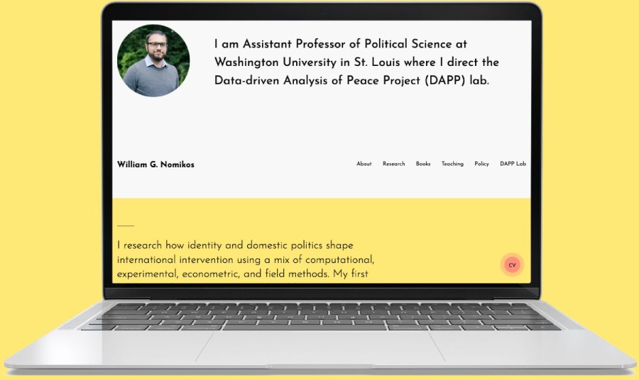 William G. Nomikos home page viewed on laptop